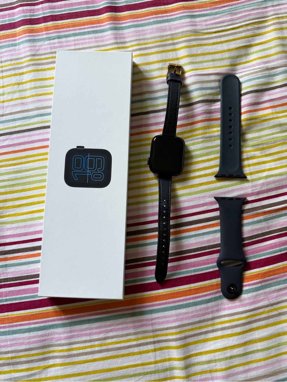 Apple Black Smartwatch with Black Leather and Dark Blue Silicone Bands